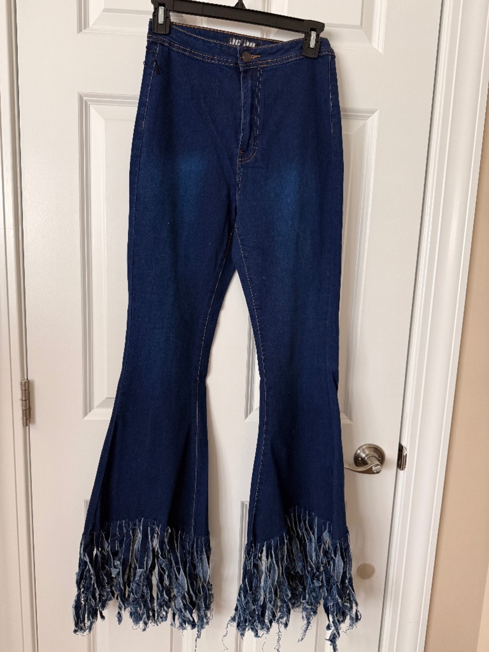 Bell bottom frayed jeans
